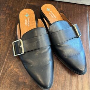 Black leather slides with gold buckle.  Size 7.5 7‎ 1/2. Baretraps. Slip on.